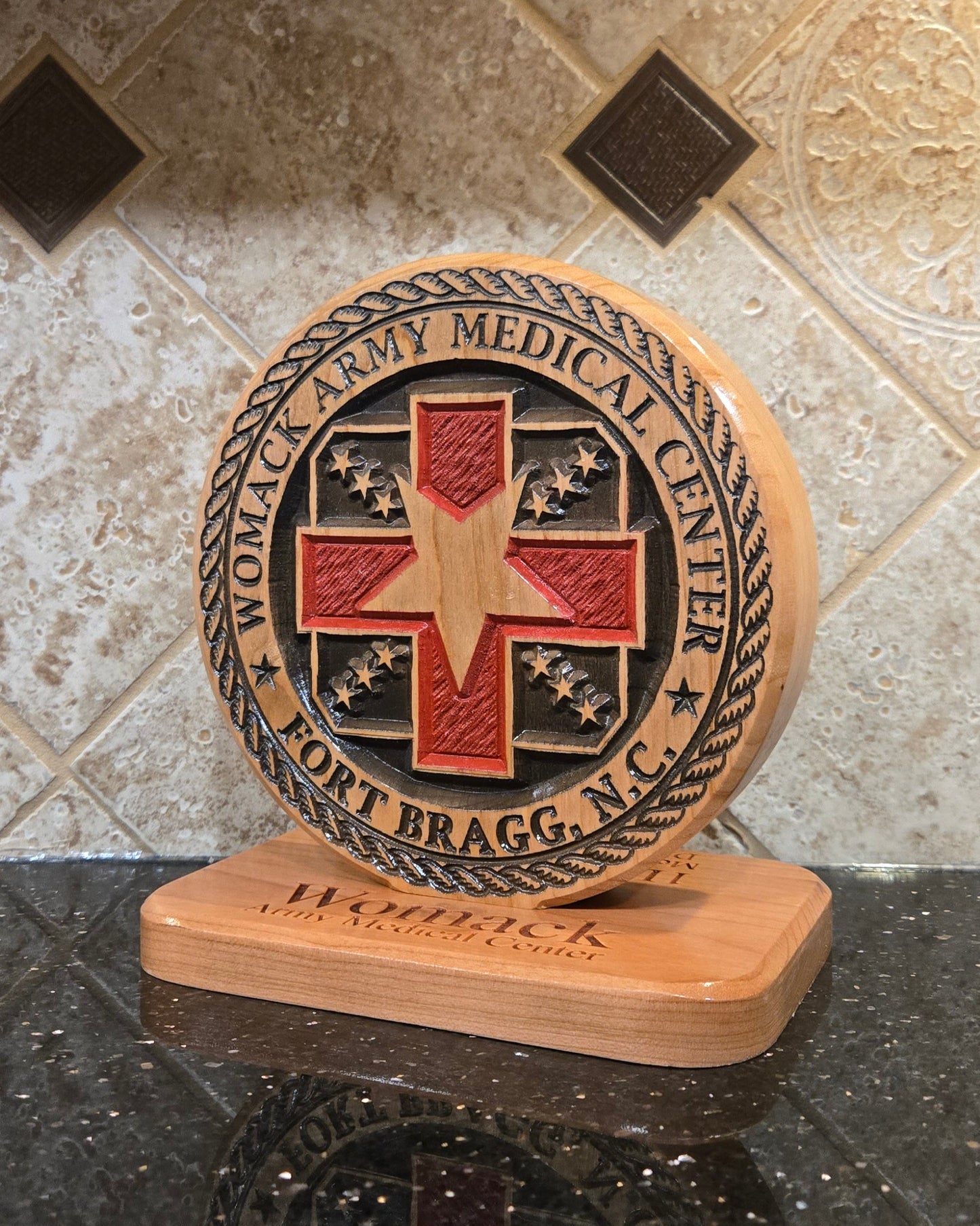 Wood carving representing Womack Army Medical Center.