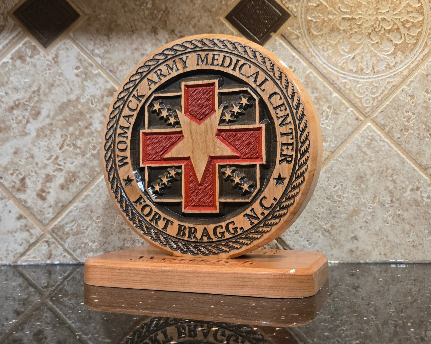 Wood carving representing Womack Army Medical Center.