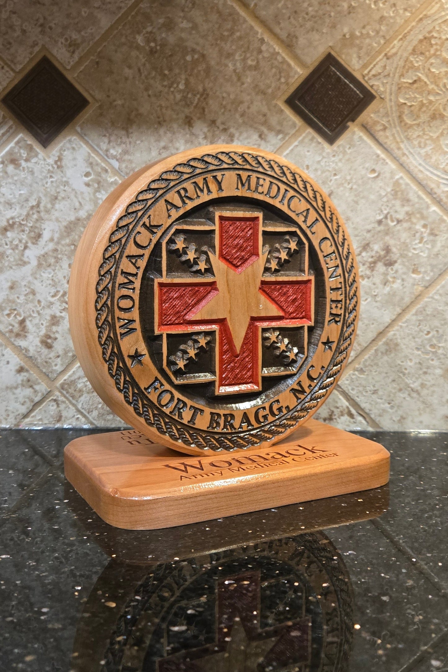 Wood carving representing Womack Army Medical Center.