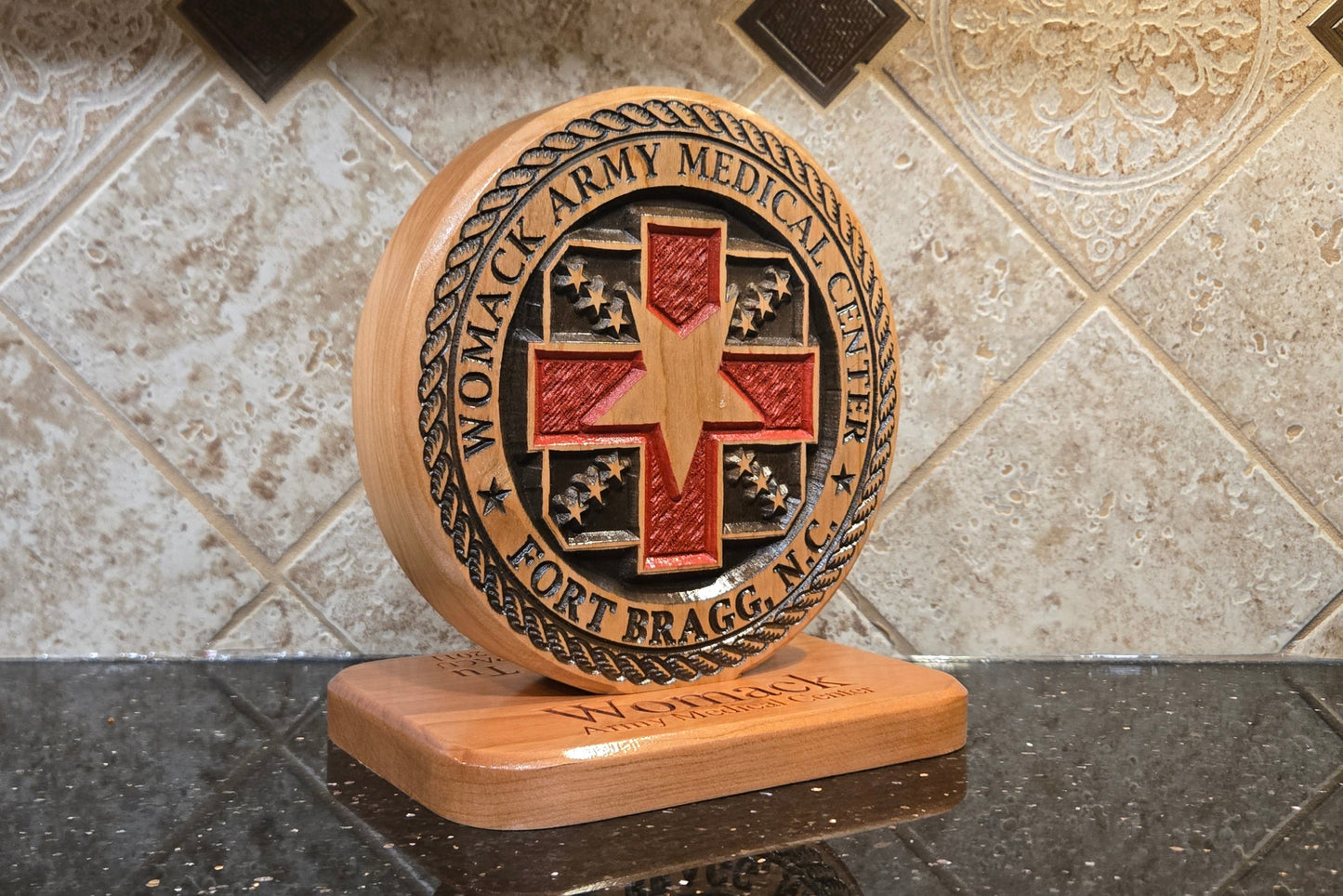 Wood carving representing Womack Army Medical Center.