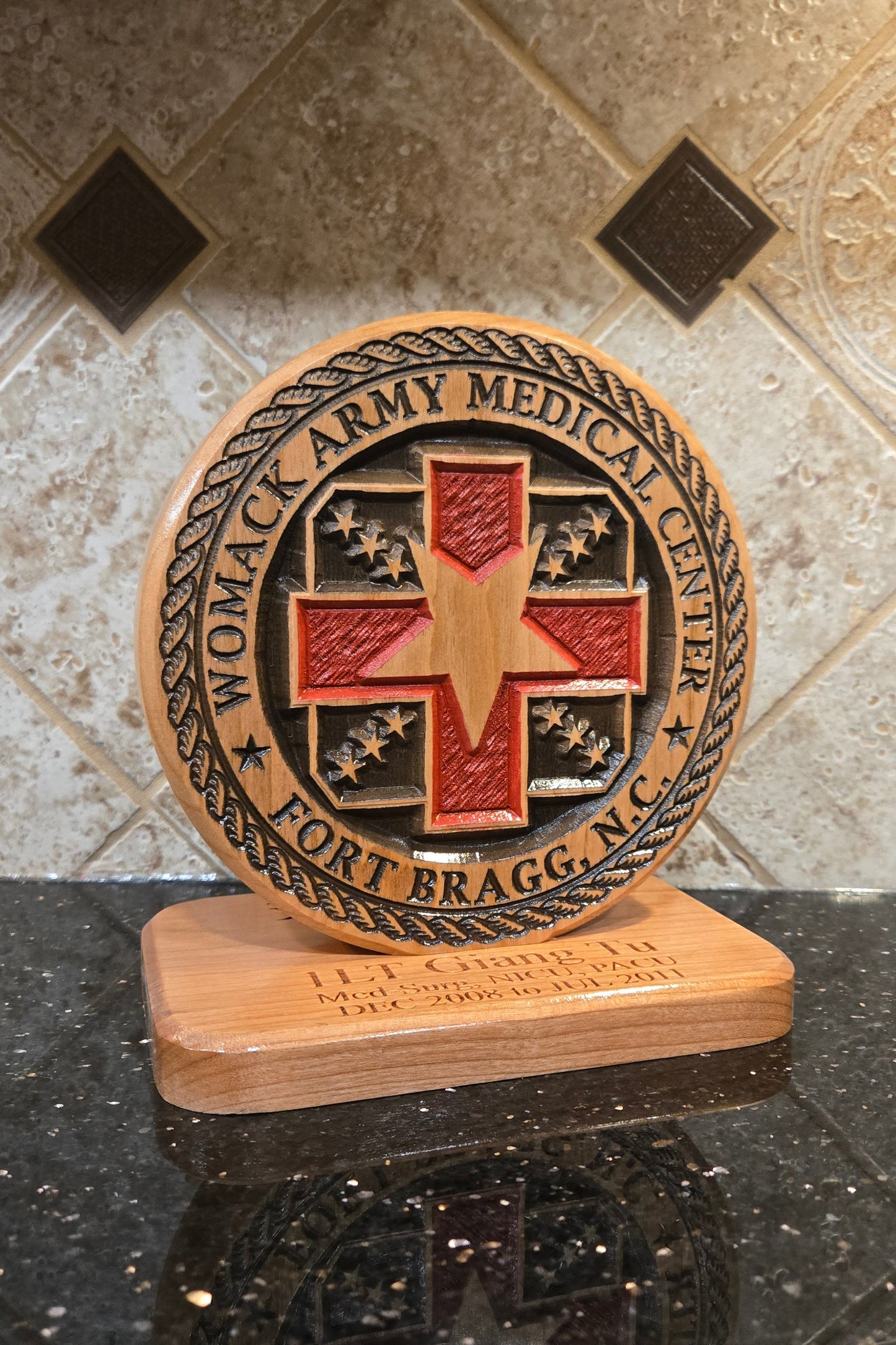 Wood carving representing Womack Army Medical Center.