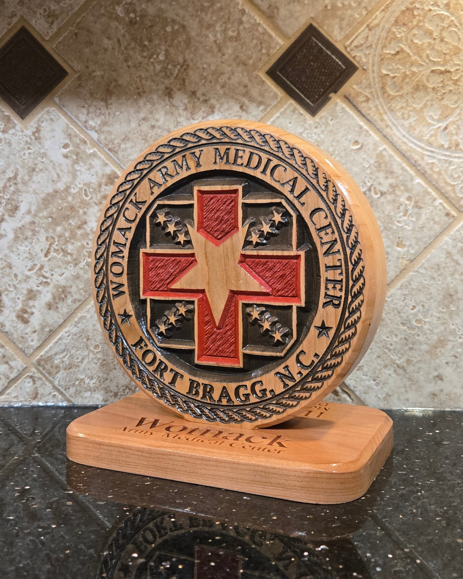 Wood carving representing Womack Army Medical Center.